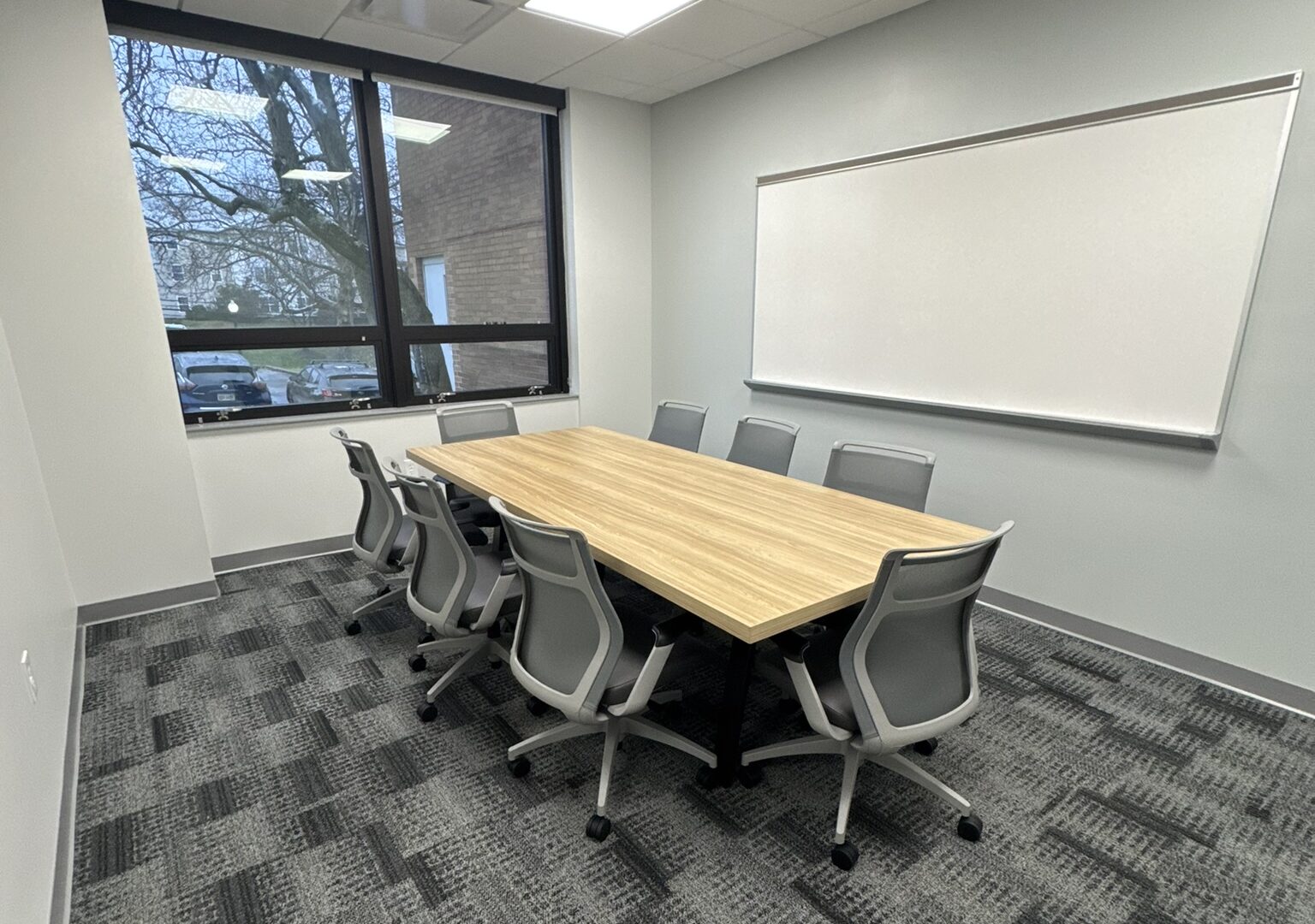 Corporate office meeting room with table and chairs